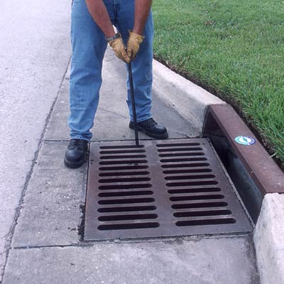 Grate Hooks Open Storm Drain Covers Easily