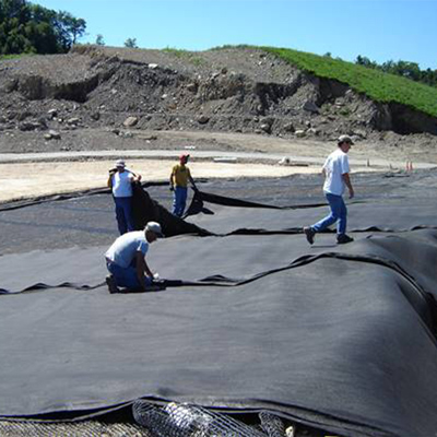 woven geotextile covered in sediment