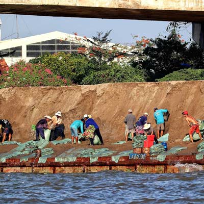 people filling sandbags